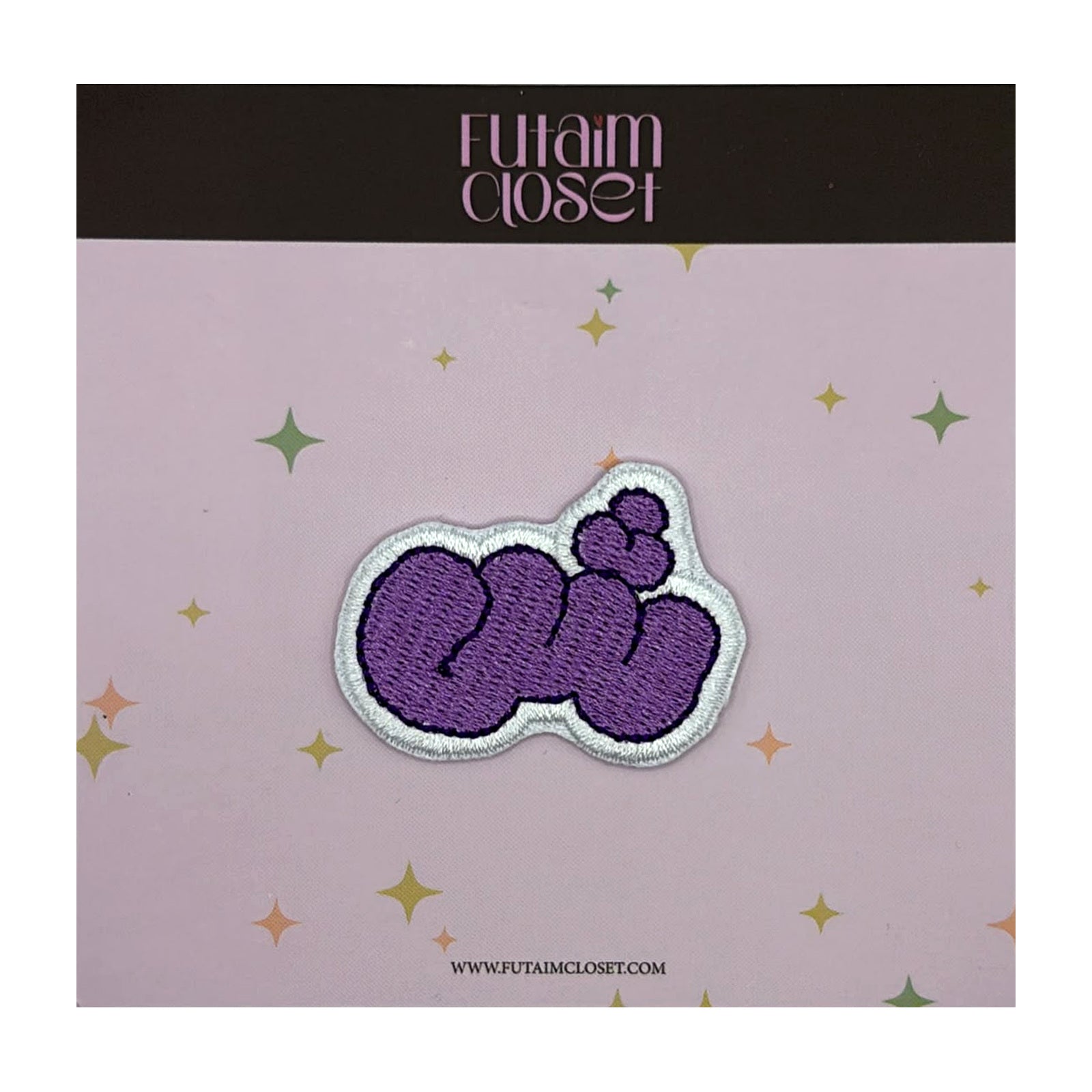 Shamma name patch in purple Arabic script on a Futaim Closet card
