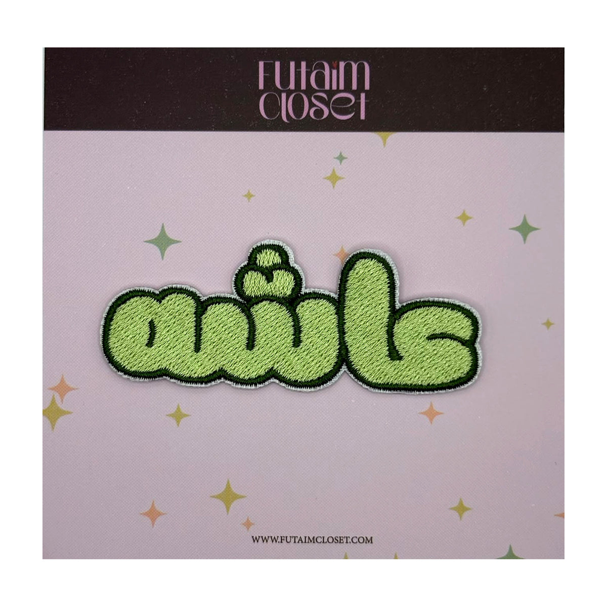 Aisha name patch in green Arabic script on a Futaim Closet card